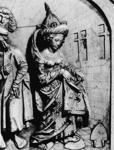 To prove her innocence of adultery, Kunigunde, wife of Holy Roman Emperor Heinrich II, walked over red-hot ploughshares (circa 1010, bas-relief from Bamberg Cathedral).