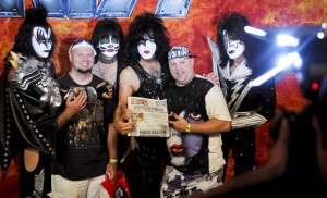 Brothers Tim Meyer (left) and Brian pose for a photo with the band KISS backstage at Minnesota State Fair in Falcon Heights, Minn., on Wednesday, August 29, 2012. "You're a celebrity," joked guitarist Paul Stanley after Brian showed him their story in the Pioneer Press. (Pioneer Press: Ben Garvin)